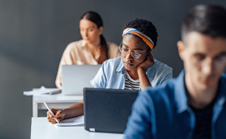 Law students in classroom taking assessment