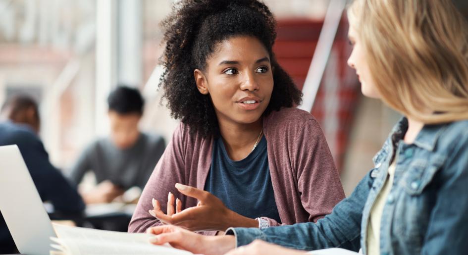 One woman counsels another