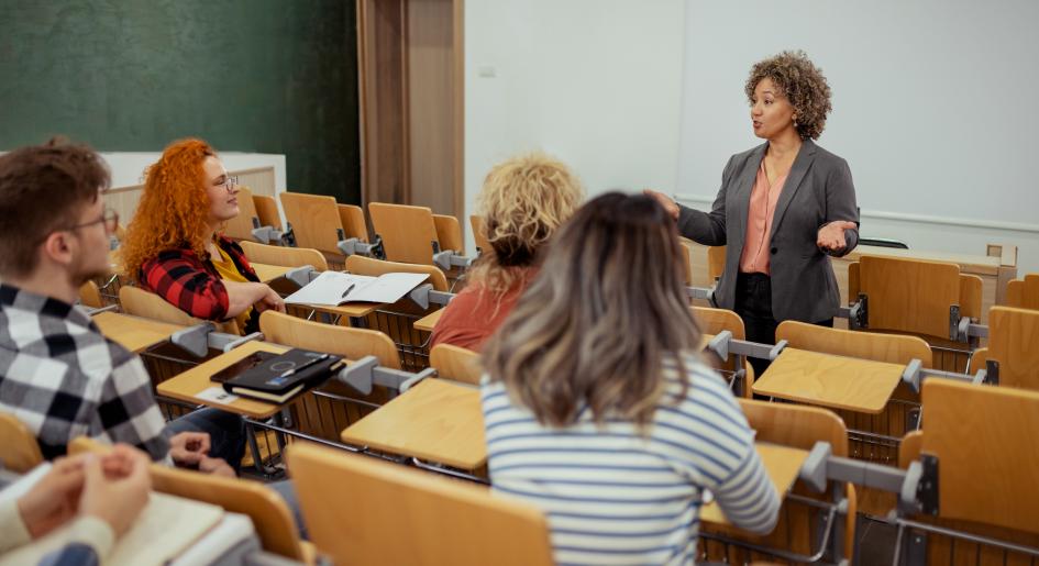 A teacher addresses a classroom of students