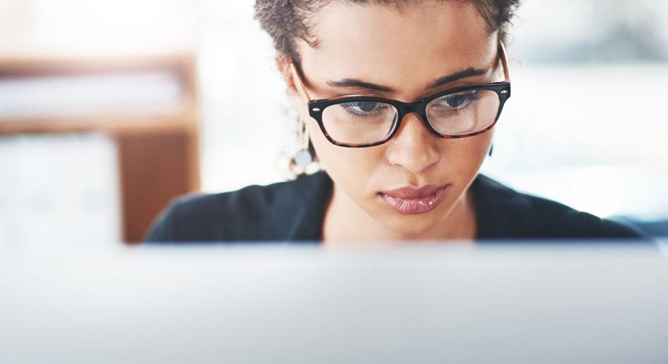 Student looking at laptop