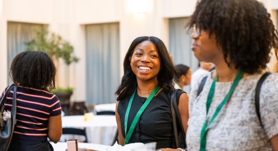 Law students at event smiling
